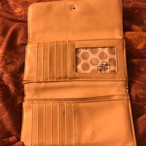 Brown and tan Guess wallet